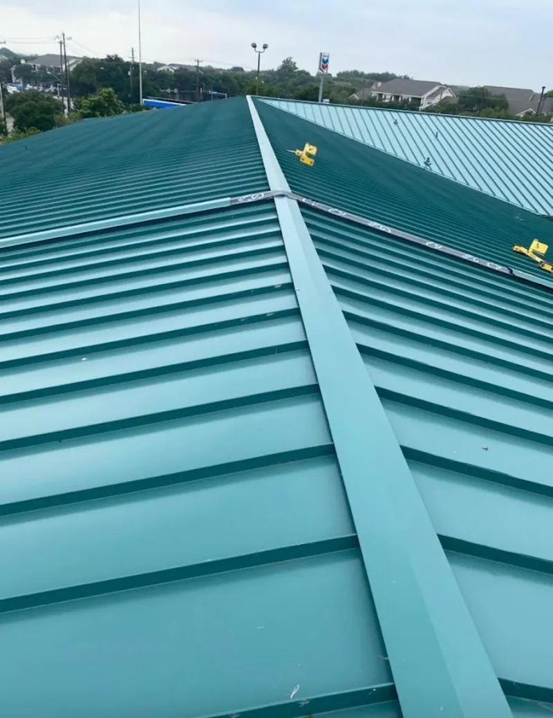 Green commercial metal roof ridge and valley for Metal Roof Repair in Alamogordo